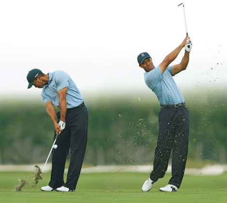 What’s the best way to get a golfer to hit down on the ball instead of trying to ‘scoop’ it?